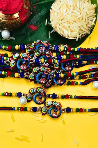 combo of 12 beaded cotton thread with ad stones & meenakari designer rakhi for brother