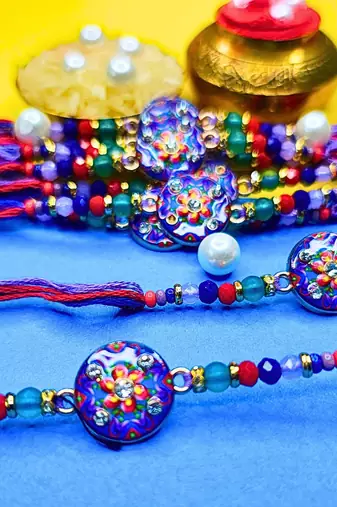 combo of 12 beaded cotton thread with ad stones & meenakari designer rakhi for brother