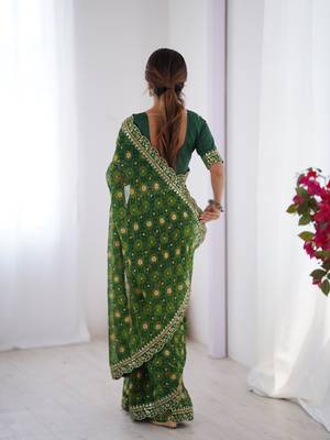 Green embroidery lace work georgette printed saree 2