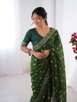 Green embroidery lace work georgette printed saree 3