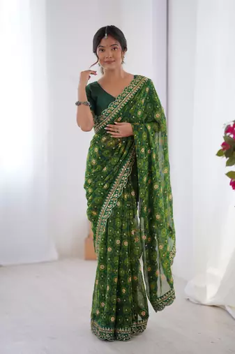 Green embroidery lace work georgette printed saree