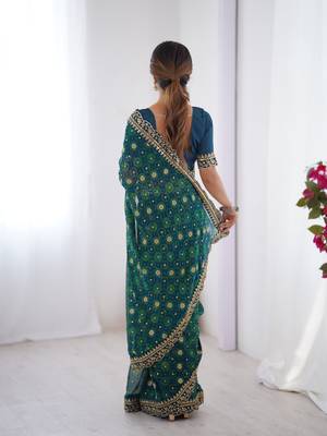 Petrol embroidery lace work georgette printed saree 2