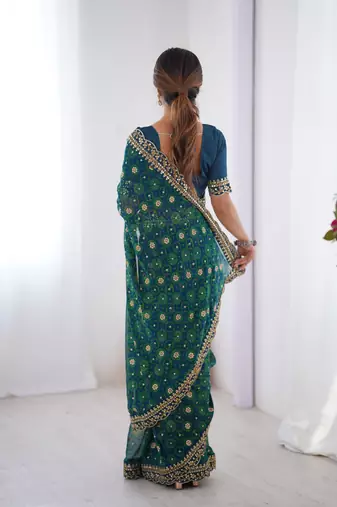 Petrol embroidery lace work georgette printed saree