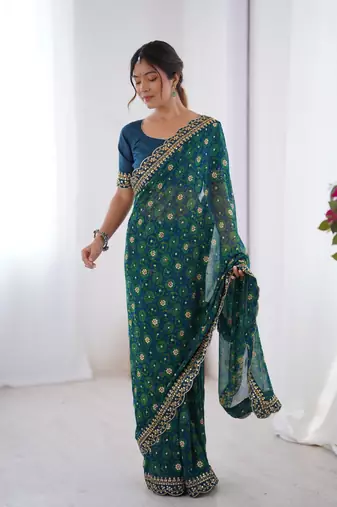 Petrol embroidery lace work georgette printed saree