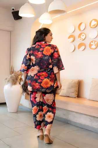 Multicolor half buttoned bold floral flared printed cotton co-ord set