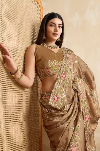 beige coding multi embroidered saree