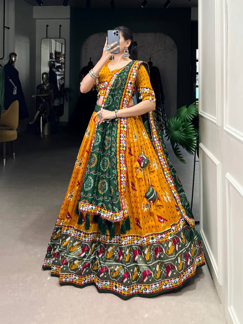 Yellow Bandhani Printed Lehenga with Foil Mirror choli and Green Dupatta