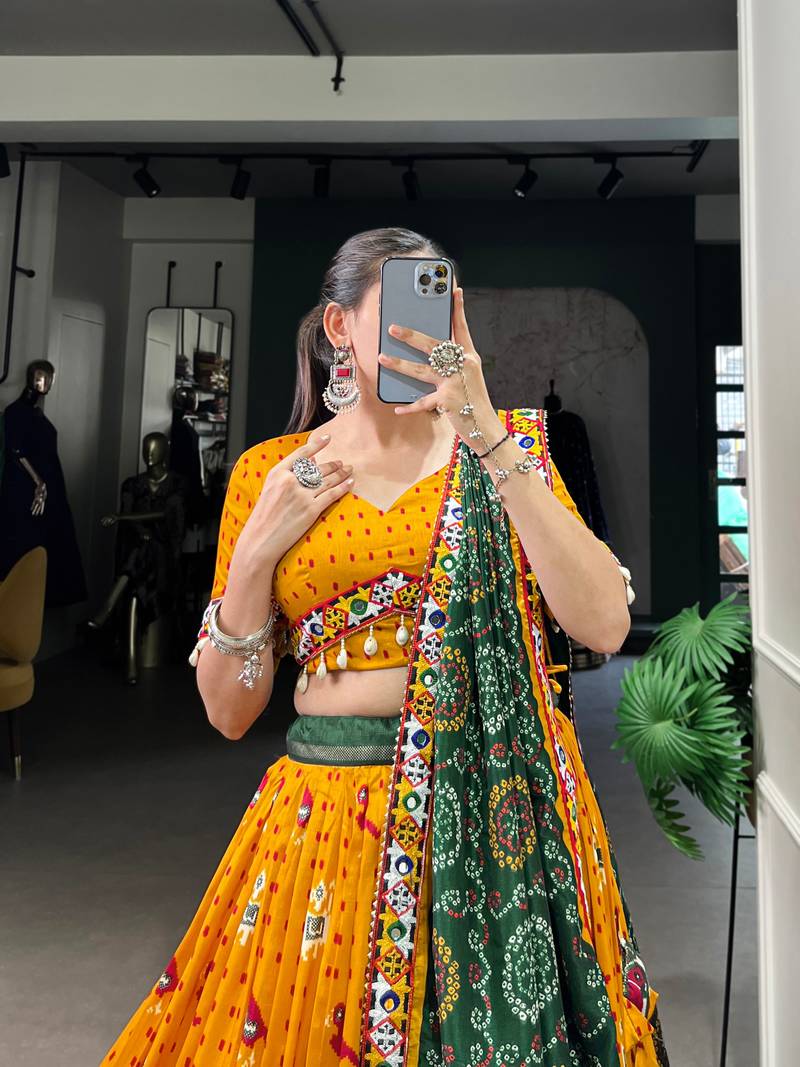 Yellow Bandhani Printed Lehenga with Foil Mirror choli and Green Dupatta