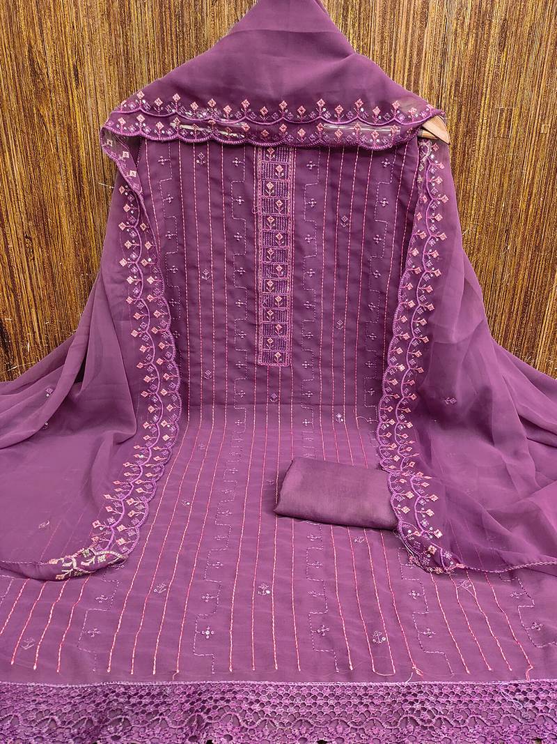 Purple unstitched suit with pink thread & mirror work embroidery