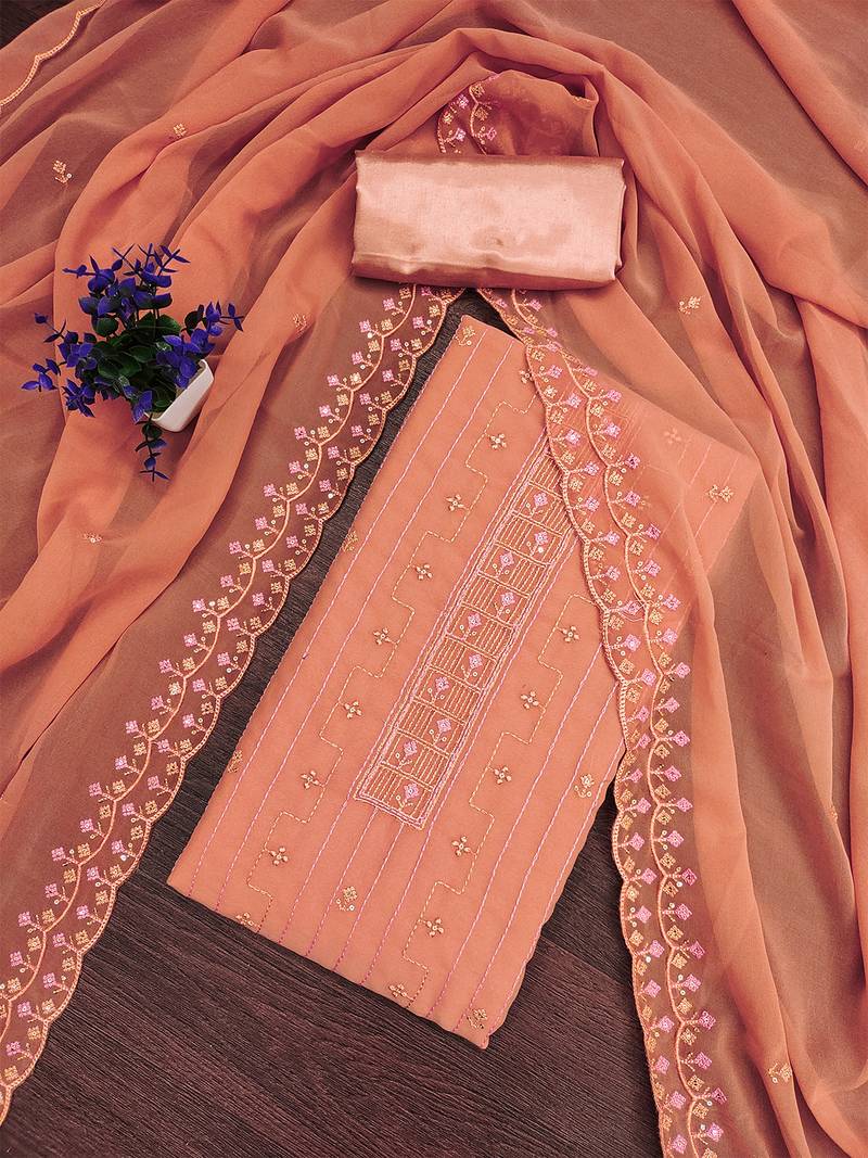 Peach unstitched suit with pink thread & mirror work embroidery