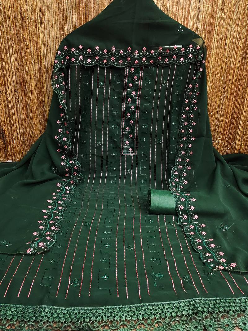 Green unstitched suit with pink thread & mirror work embroidery