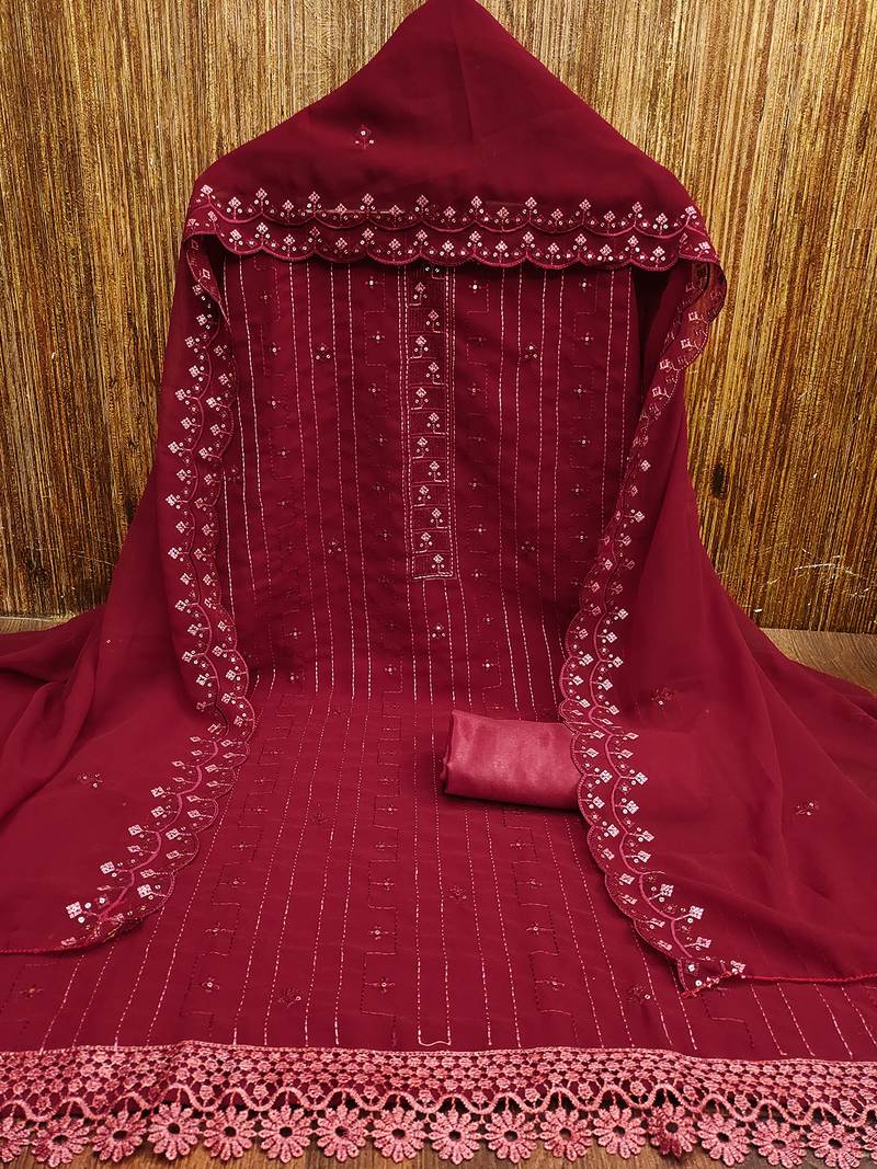 Maroon unstitched suit with pink thread & mirror work embroidery