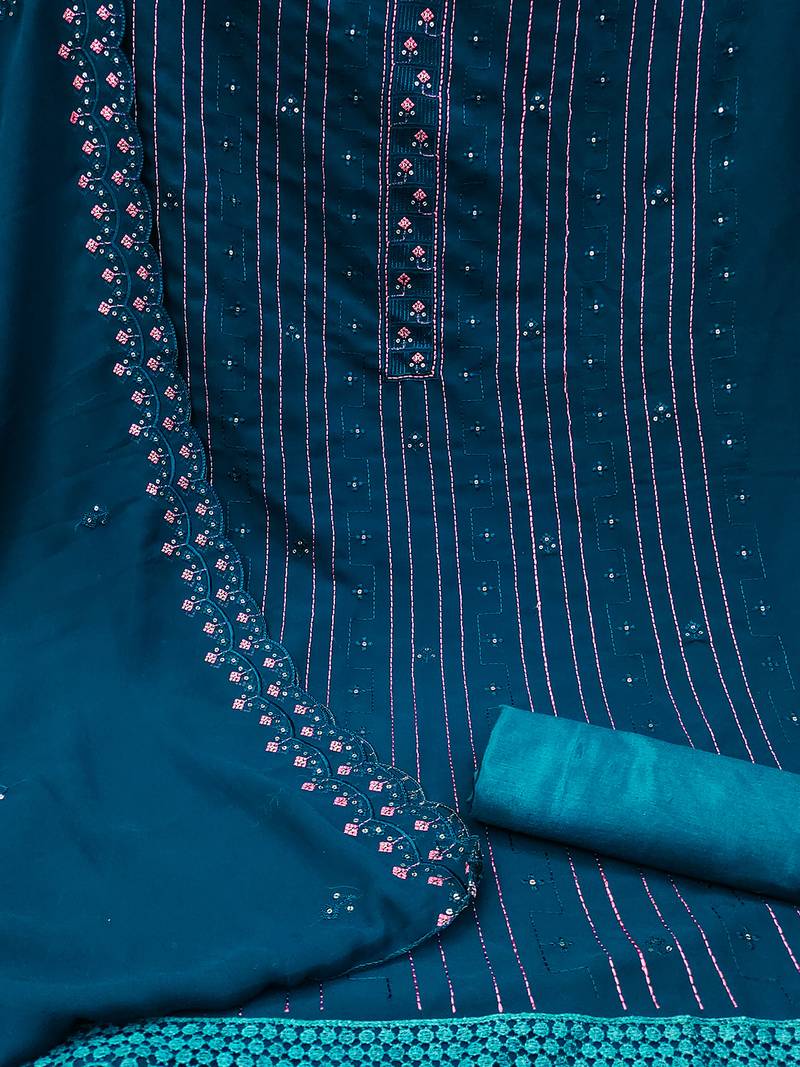 Blue unstitched suit with pink thread & mirror work embroidery