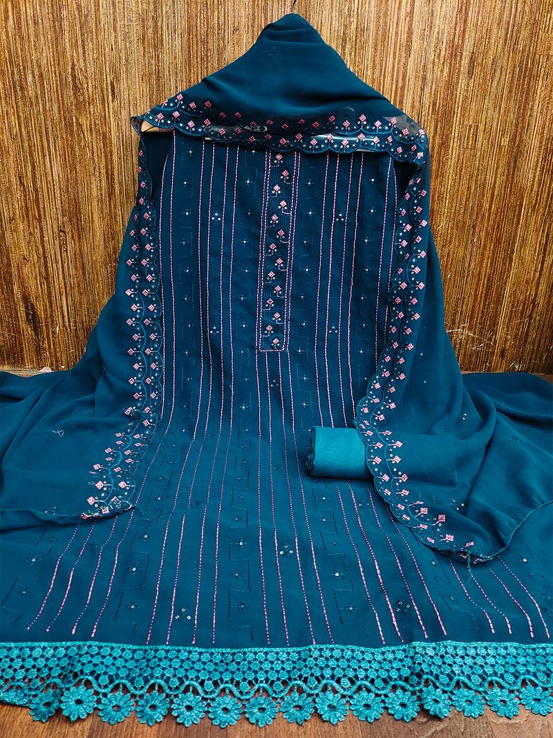 Blue unstitched suit with pink thread & mirror work embroidery