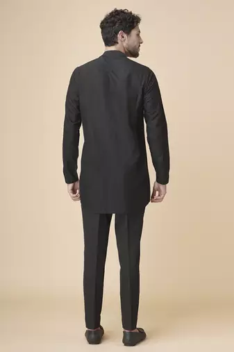 Black silk geometric printed jacket paired with kurta & pant