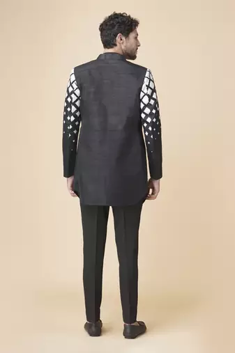 Black silk geometric printed jacket paired with kurta & pant