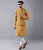 Mustard silk printed kurta jacket paired with kurta & pant