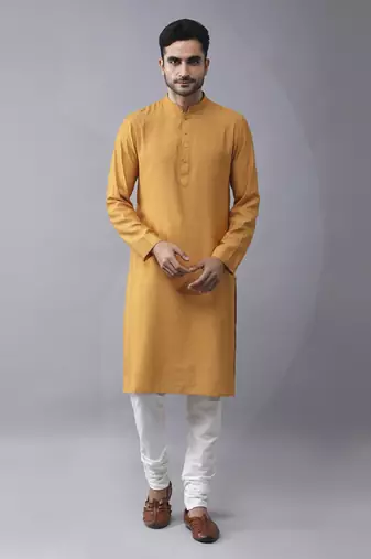 Mustard silk printed kurta jacket paired with kurta & pant