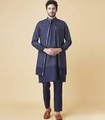 Navy blue silk printed jacket paired with kurta & pant