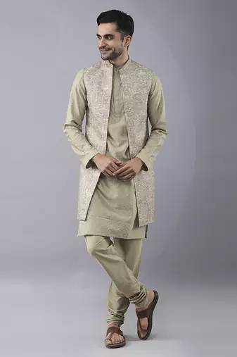 Pastel gold solid silk jacket paired with kurta & curidaar