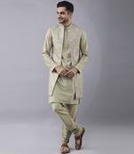 Pastel gold solid silk jacket paired with kurta & curidaar