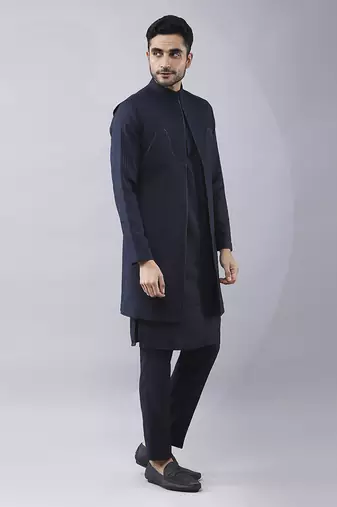 Navy blue solid silk jacket paired with kurta & pant