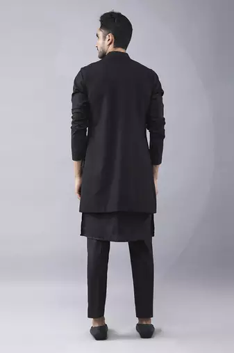 Black solid silk jacket paired with kurta & pant