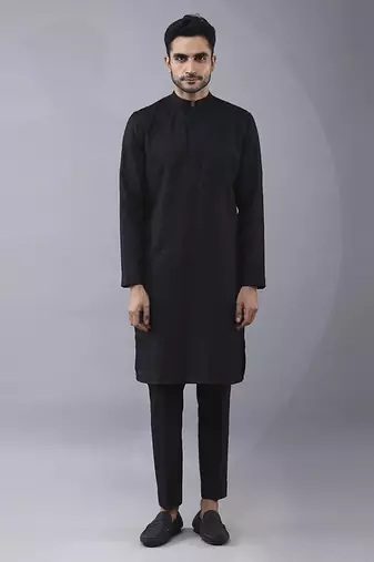 Black solid silk jacket paired with kurta & pant