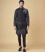 Black printed silk bandhgala jacket paired with kurta & pant