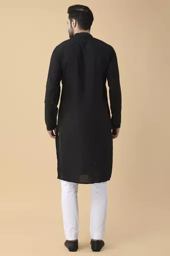Black solid silk bandhgala jacket paired with kurta & pant
