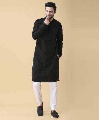 Black solid silk bandhgala jacket paired with kurta & pant 4
