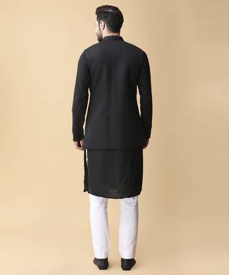 Black solid silk bandhgala jacket paired with kurta & pant 5