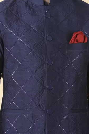 Navy blue solid silk bandhgala jacket paired with kurta & pant