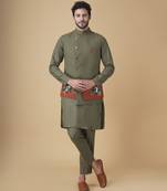 Emerald solid silk bandhgala jacket paired with kurta & pant