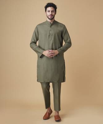 Emerald solid silk bandhgala jacket paired with kurta & pant 4