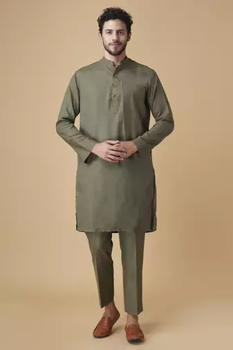 Emerald solid silk bandhgala jacket paired with kurta & pant