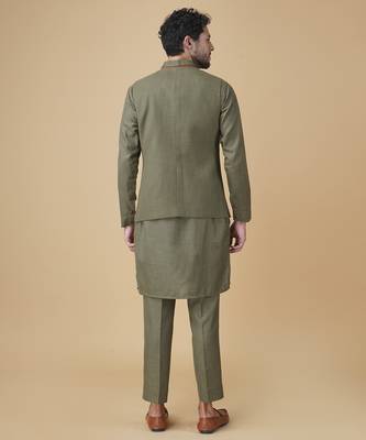 Emerald solid silk bandhgala jacket paired with kurta & pant 5