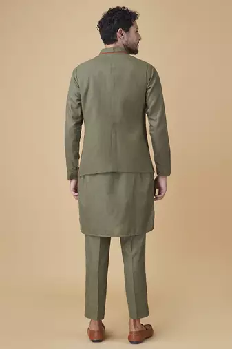 Emerald solid silk bandhgala jacket paired with kurta & pant