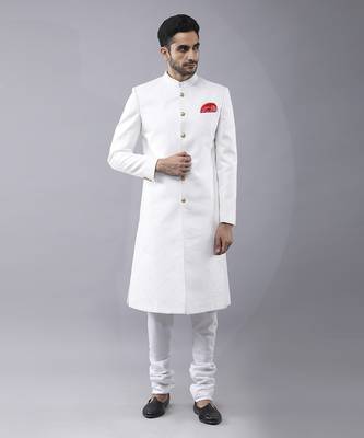 White brocade solid sherwani paired with kurta & churidaar 1