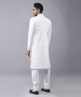White brocade solid sherwani paired with kurta & churidaar 2