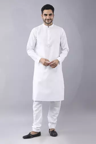 White brocade solid sherwani paired with kurta & churidaar