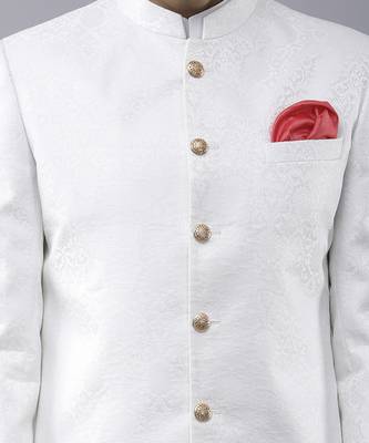 White brocade solid sherwani paired with kurta & churidaar 4