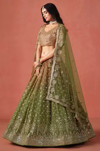 Delightful gradient from warm beige to deep mehndi green sequins zari embroidered georgette indian lehenga