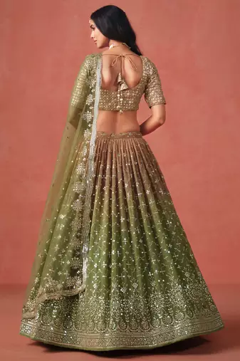 Delightful gradient from warm beige to deep mehndi green sequins zari embroidered georgette indian lehenga