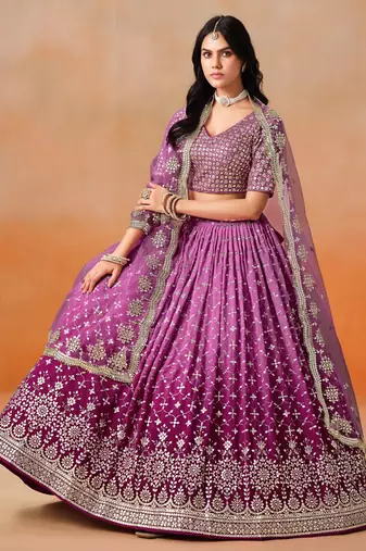 Graceful rani pink zari sequins embroidered georgette indian wedding designer lehenga dress