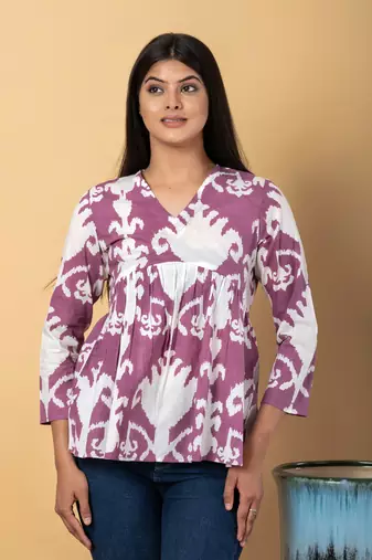 Mauve and white cotton peplum top