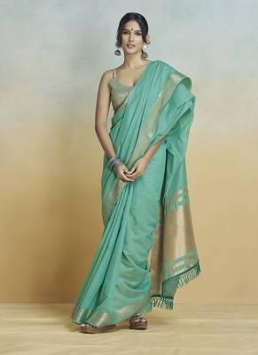 Tourquise khadi silk blend saree with tussle  1
