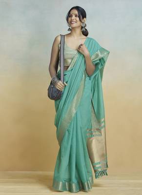 Tourquise khadi silk blend saree with tussle  2