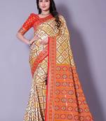 multicolor patola cream saree with red border pallu