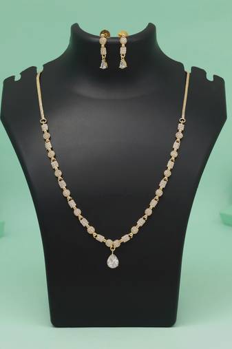 Gold & White color american diamond necklace set with sparkling and regal appearance